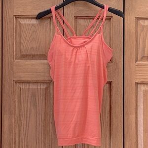 Athleta coral tank top with built in bra with removable pads. Women’s medium